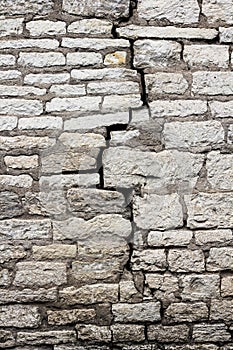 A crack in the old masonry, in the wall.