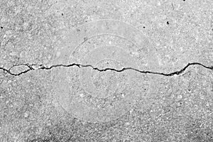 Crack white concrete texture background.