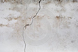 Crack in a white wall photo