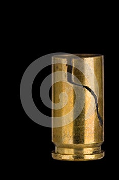Cracked 9 mm shell casing