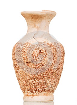 Cracked antique vase isolated on white .
