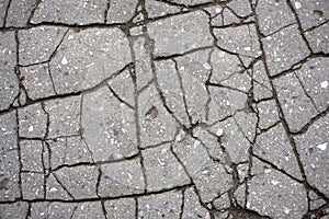 Cracked asphalt. Old asphalt background. Asphalt pattern.