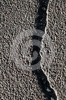 Cracked asphalt road surface texture, Cement on the ground texture.