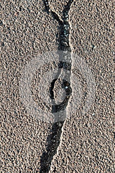 Cracked asphalt road surface texture, Cement on the ground texture.