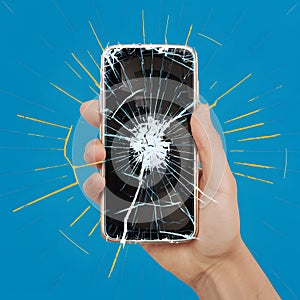 Cracked cell phone symbolizes modern frustration and technological fragility