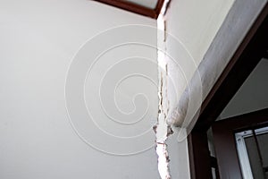 The cracked cement wall texture in the house,cracking separation of the concrete ceiling from subsidence ground,problems with non-