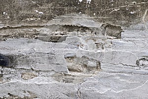 Cracked concrete old brick wall background