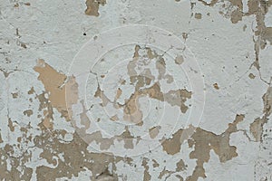 Cracked concrete wall covered with gray cement surface as background