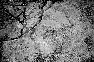 Cracked concrete wall texture background in public area.