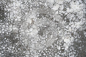 Cracked concrete wall texture.