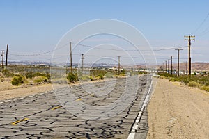 Cracked and crazed Route 66 road surface, California, USA photo