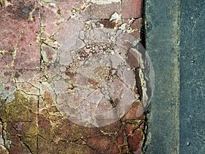 Damaged cements footpath.