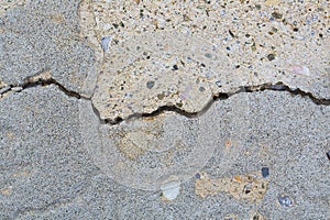 Cracked and damaged concrete wall