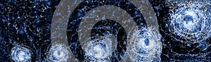 Cracked dark blue banner background with bullet hole in glass isolated on white