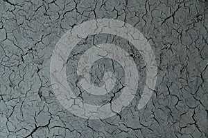 Cracked dry clay wall texture