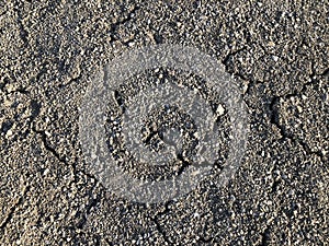 Cracked dry ground mud, dried under sun road