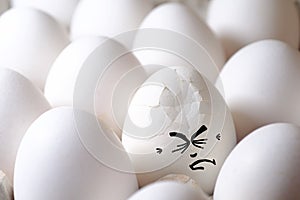 Cracked egg among all eggs