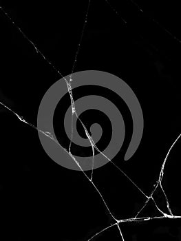 Cracked glass texture on black background