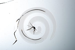 Cracked glass on a white background texture