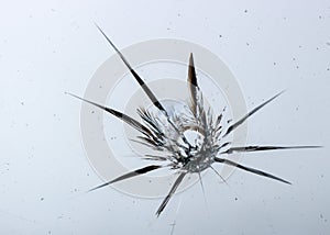 Cracked glass on a white background texture