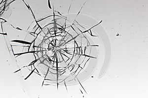 Cracked glass on a white background texture