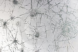 Cracked glass on a white background texture