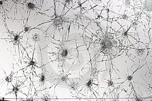 Cracked glass on a white background texture