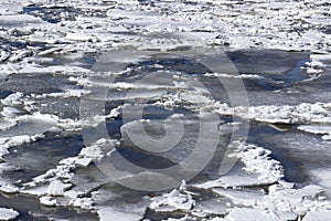 Cracked ice on the river background