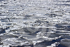 Cracked ice on the river background