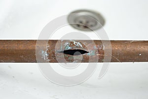 Cracked open copper pipe due to freezing with water inside