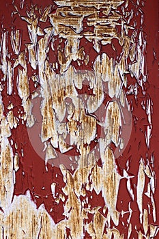 Cracked and peeled paint on the iron surface