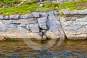 Cracked Rocks Erode in the River photo