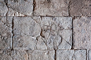 Cracked stone texture, antique stone floor / wall with cracks