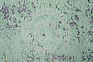Cracked surface painted wooden texture green background