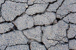 Cracked tarmac surface