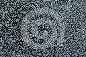 Cracked tempered glass with cracks pattern. Vandalism, destruction concept