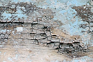 CRACKED TEXTURE ON DETERIORATING WOOD
