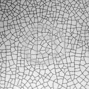 Cracked texture of old ceramic pottery