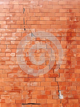 Cracked wall brick wall texture, old wall with red brick background with old dirty and vintage style pattern