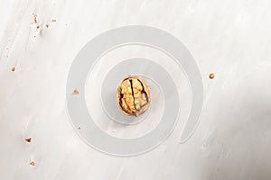 cracked walnut isolated on concrete background