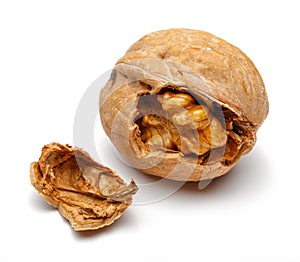 Cracked walnut isolated on white