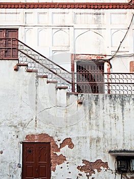 Cracked Weathered Building with Rusty Doors India