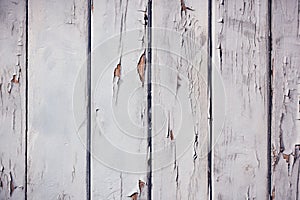 Cracked white paint on wood board, abstract rustic retro vintage background