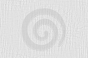 Cracked white paint on wooden door, seamless tileable pattern background