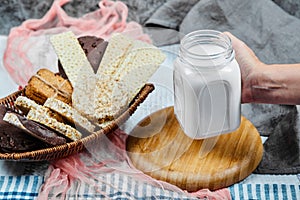 Cracker and cookies with a jar of milk