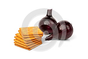 Cracker cookies with onion isolated on white background