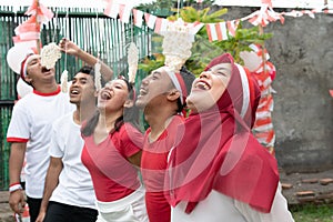 Cracker eating competition on Indonesia`s Independence Day celebrations in the field