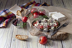 Crackers with tomatoes and feta cheese