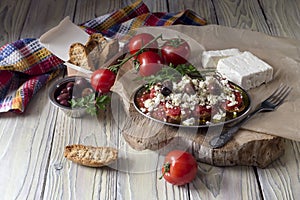 Crackers with tomatoes and feta cheese photo
