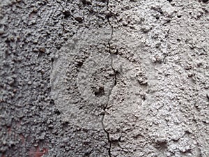 Cracking cement wall.